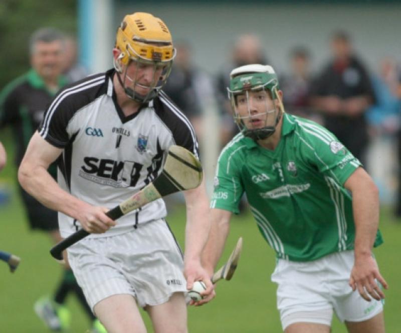Pat Mulhearn (Mullinavat) is closed down by Padraig Phelan (Emeralds) during the Intermediate Hurling League clash in Kilmanagh.  (Photo: Eoin Hennessy)