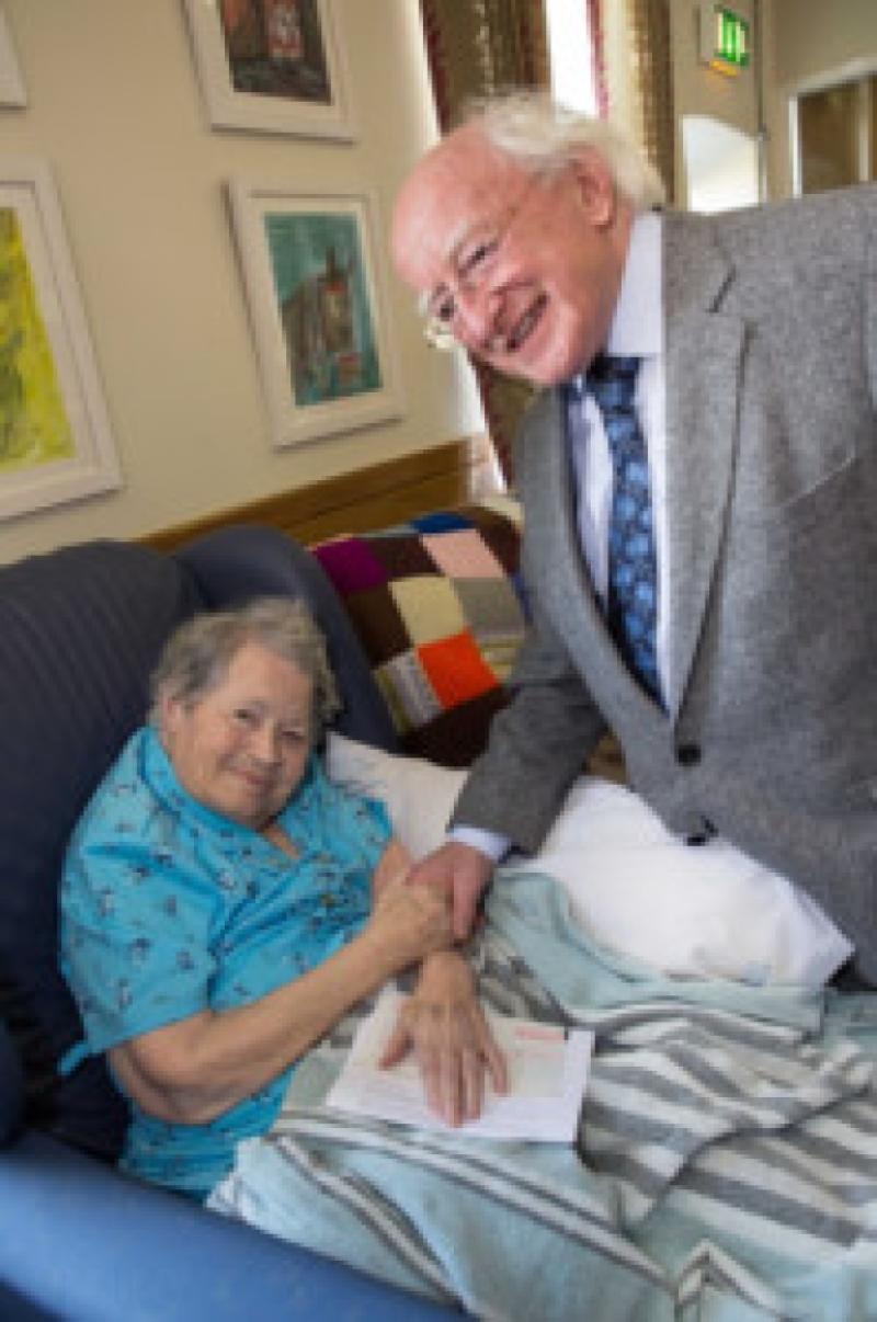 29/05/2013: President Michael D. Higgins presented 100 year old May Bambrick, originally from Maddoxtown in Co Kilkenny, with her cheque and letter which traditionally comes from the President of Ireland to mark a hundreth birthday, during his visit to St Columba's Hospital in Thomastown on Monday afternoon. Photo: Pat Moore.