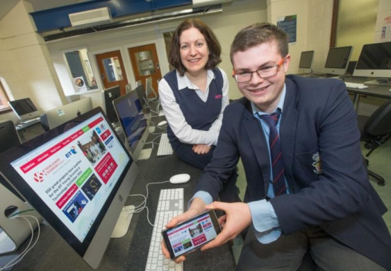 Kilkenny College student Jack O'Sullivan (16) who was a double prize winner at the BT Young Scientist & Technology Exhibition pictured with his teacher Erica McNiece. Photo: Pat Moore.
