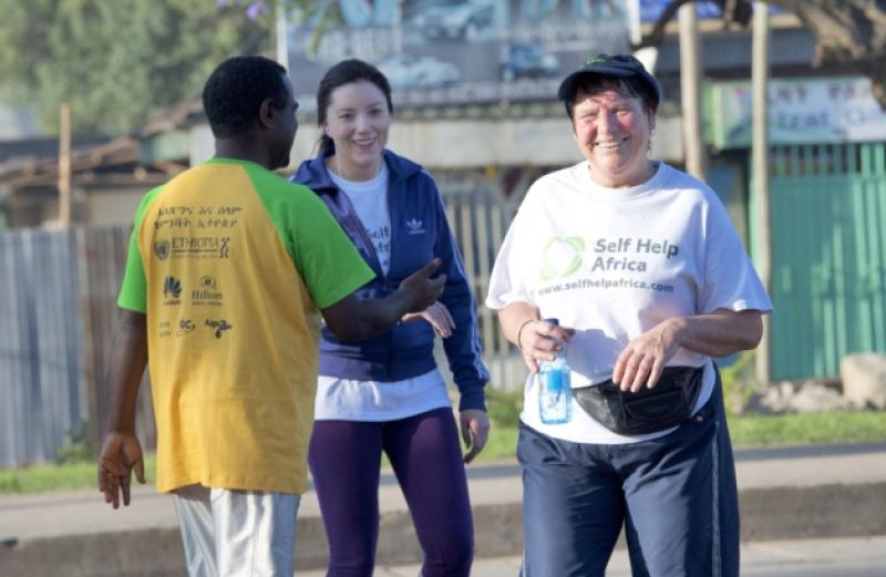 24/11/2013 repro free    Catherine Weir Tullamore, and Enda Teehan Tullow are congratulated by  Bellaw Damel Self Help Africa after completing  the Great Ethiopian run in Hawassa as opposed to the Capital Addis Ababa due to a security threat, part of a group of 20 from Ireland who ran the race in aid of Self Help Africa. Photo:Andrew Downes