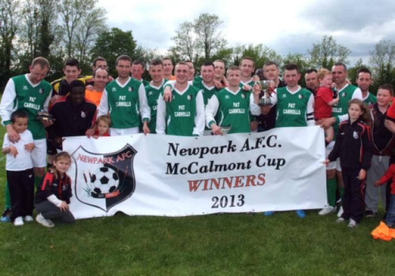 Newpark players and fans celebrate winning the McCalmont Cup. Photo: Michael Brophy