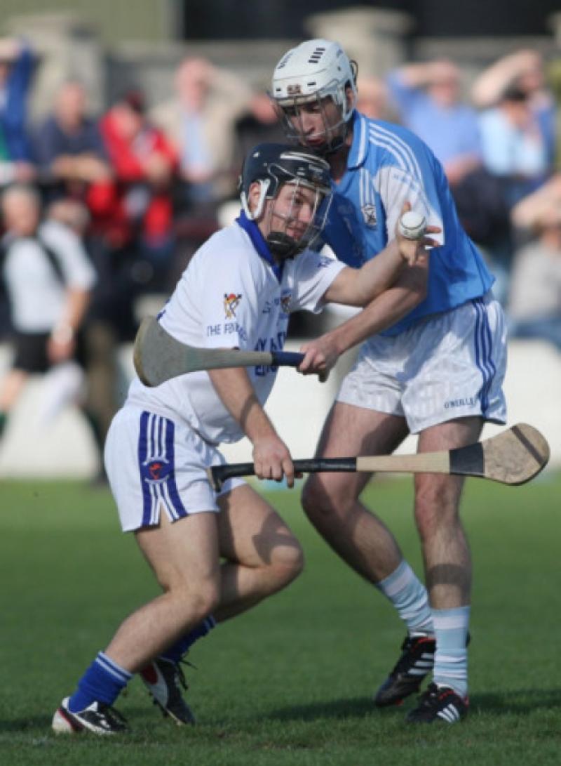Willie Brennan (Fenians) is challenged by John Cleere (Graigue-Ballycallan) during the Senior Hurling Championship Relegation Final in Palmerstown.