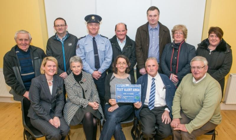 Nicola Murphy, Margaret Quinn, Fionnuala Davis, Cllr Billy Ireland, Tom O'Shea, John Sullivan, Philip Molloy, Sgt Ted Hughes, Donal Sheridan, Neville Stanley, Catherine David and Breda Farrell pictured at the launch of the Danesfort Community Text Alert. Photo: Pat Moore.