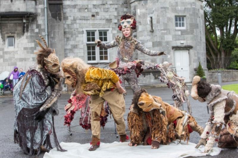 14/08/2013 (NO REPRO FEE): The award-winning Macnas performed a brand new show for the Kilkenny Arts Festival on Wednesday afternoon. . Chaosmos is a walkabout street show where wild beasts, masked performers, an ethereal Alchemist and a curious insect pedalling a bicycle meandered through the streets from the Castle Park to the Courthouse. Combining music, spectacle and live performance. Pictured here is the group as they head for the streets of Kilkenny. Photo: Pat Moore.( NO REPRO FEE): The award-winning Macnas performed a brand new show for the Kilkenny Arts Festival on Wednesday afternoon. . Chaosmos is a walkabout street show where wild beasts, masked performers, an ethereal Alchemist and a curious insect pedalling a bicycle meandered through the streets from the Castle Park to the Courthouse. Combining music, spectacle and live performance. Pictured here is the group waking up after having a nap in the Kilkenny Castle Park. Photo: Pat Moore.