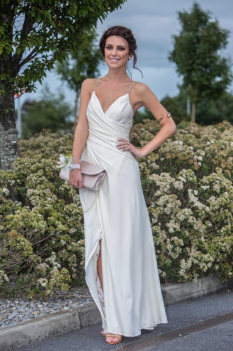 27/08/2013 (NO REPRO FEE) Grace O�"Mahony, winner of last year�"s Kilkenny Fashion Week Student Scholarship, is pictured in the Debs dress she made herself during her summer scholarship at the Grafton Academy of Dress Designing in Dublin. Grace wore the dress, featuring intricate draping detail, to her debs ball on Monday night and was assisted in its creation by the Academy�"s senior head tutor Colin Atkinson. The Loreto Secondary school student, who is a part-time model with 1st Option, plans on a career as a fashion designer and will study fashion design in college this Autumn. Details of this year�"s Kilkenny Fashion Week Student Scholarship are available on www.kilkennyfashionweek.com. Photo: Pat Moore.