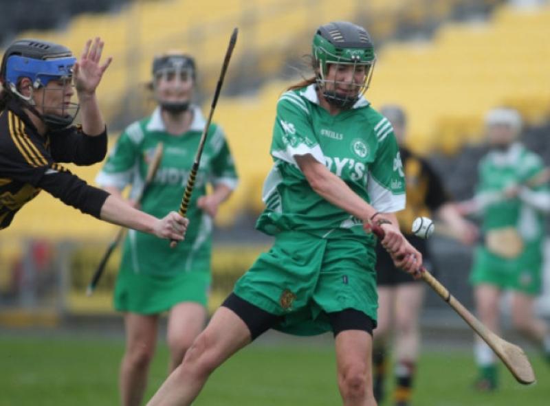 Edel Frisby (Ballyhale Shamrocks) keeps her eye on the sliotar as Niamh Dollard (Camross) closes in during the Leinster Intermediate Camogie Final in Nowlan Park.  (Photo: Eoin Hennessy)
