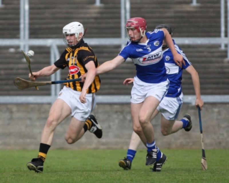 Liam Blanchfield (Kilkenny) is marked closely by Ryan Mullaney (Laois) during the Leinster minor hurling semi-final in OMoore Park, Portlaoise on Saturday evening.  Kilkenny won the game by eight points, setting up a second meeting with Dublin in the provincial final in Croke Park on July 6. Photo: Eoin Hennessy