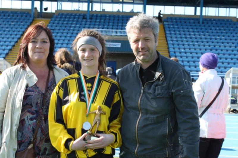 Kilkenny's Jenninfer O'Keeffe, who won Player of the Tournament at the Viking Iner-League Tournament in Waterford, with her parents Alison and Eric O'Keeffe.