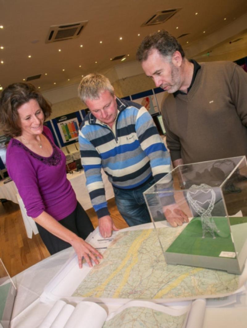 Deborah Meghen, Eirgrid Transmission Project manager pictured with Willie Kearns, Mooncoin and James Culleton, Piltown at the Eirgrid public meeting in the Springhill Court Hotel last Friday. Photo: Pat Moore.