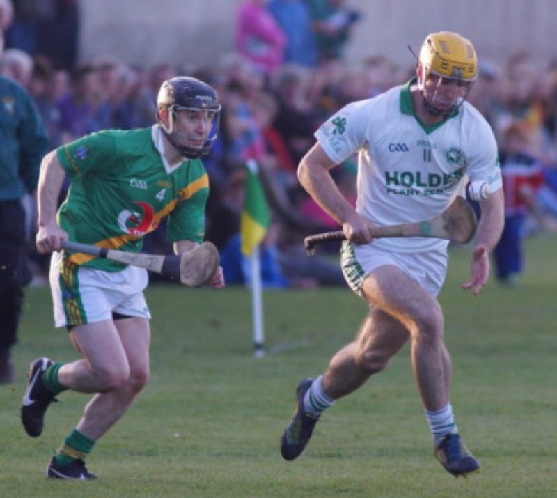 David Franks (Carrickshock) chases after Colin Fennelly (Ballyhale Shamrocks) during the SHL encounter in Hugginstown.  (Photo: Eoin Hennessy)