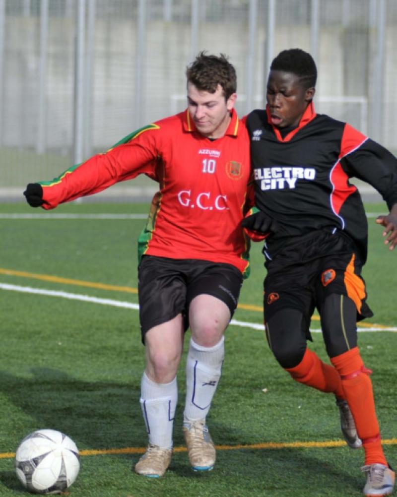 Gabriel Ayuri (Callan CBS) challenges Luke O Corcorain (Gaelcholaiste Carlow) for possession during their Leinster U-19 final. Photo: Michael Brophy