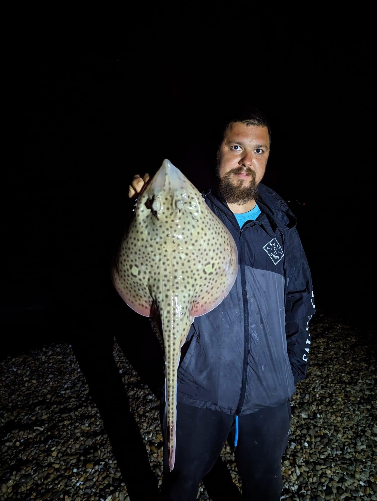 Saleem Ali with a spotted ray 